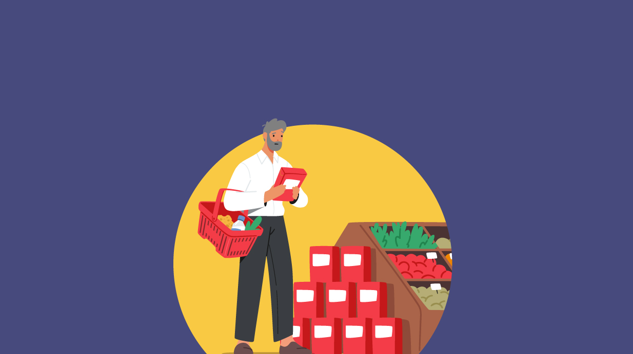 A man in a grocery store reads the label on a box.