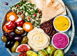 A tray filled with Mediterranean-style snacks.