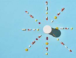 An assortment of pills arranged to create a star.